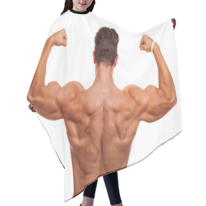 Personality  Rear View Shot Of A Male Bodybuilder Showing Off His Muscles, Flexing Biceps And Back Isolated. Athletic Shirtless Man Posing Powerfully. Fitness Man With Stunning Strong Body. Health, Fitness Concept Hair Cutting Cape