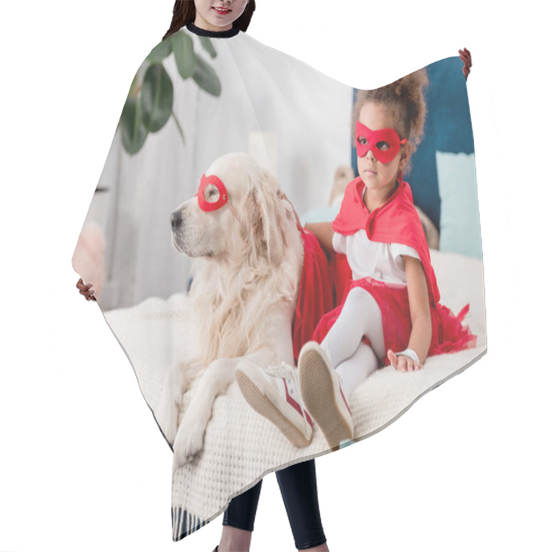 Personality  Adorable Little African American Kid With Dog In Superhero Costumes Sitting On Bed Hair Cutting Cape