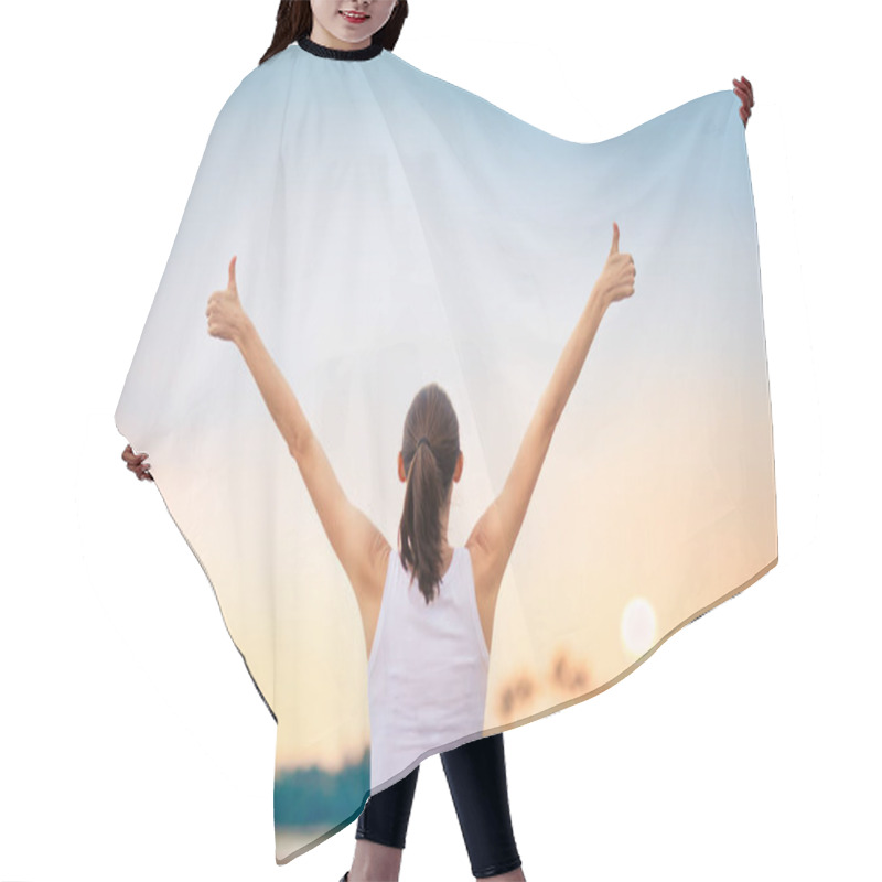 Personality  Young Woman With Arms In The Air Giving Thumbs Up. Hair Cutting Cape