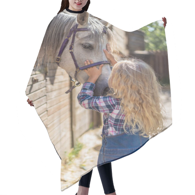 Personality  Side View Of Preteen Kid Touching Horse At Farm Hair Cutting Cape