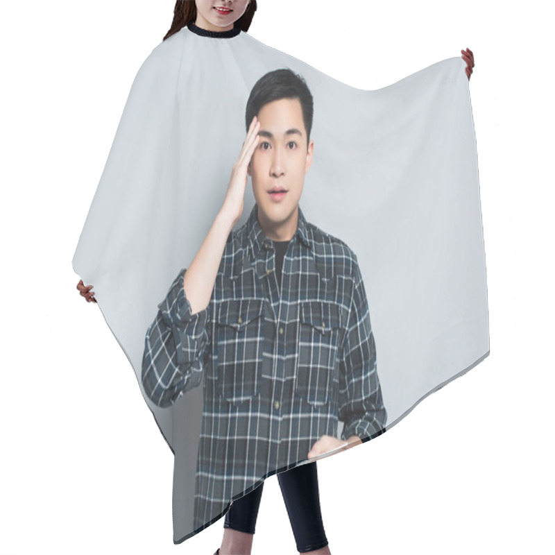 Personality  Shocked Asian Man Touching Forehead And Looking At Camera While Holding Thermometer On Grey Background Hair Cutting Cape