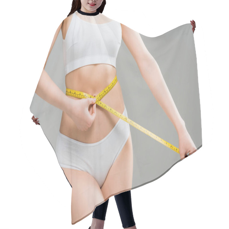 Personality  Cropped View Of Young Woman In Underwear Standing And Measuring Body With Measuring Tape Isolated On Grey  Hair Cutting Cape