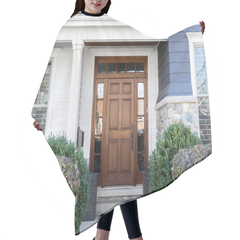 Personality  A Wooden Front Door, Surrounded By Windows, With White, Blue, And Stone Siding. Hair Cutting Cape