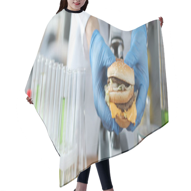 Personality  Male Hand Hold Burger In Hand With Blue Protective Gloves Hair Cutting Cape