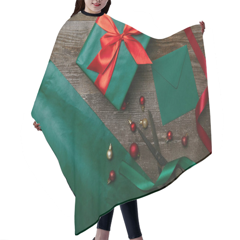 Personality  Top View Of Christmas Toys, Wrapped Present With Ribbon And Blank Envelope For Greeting Card On Wooden Background Hair Cutting Cape