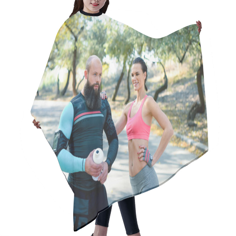 Personality  Athletic Couple Resting After Workout  Hair Cutting Cape