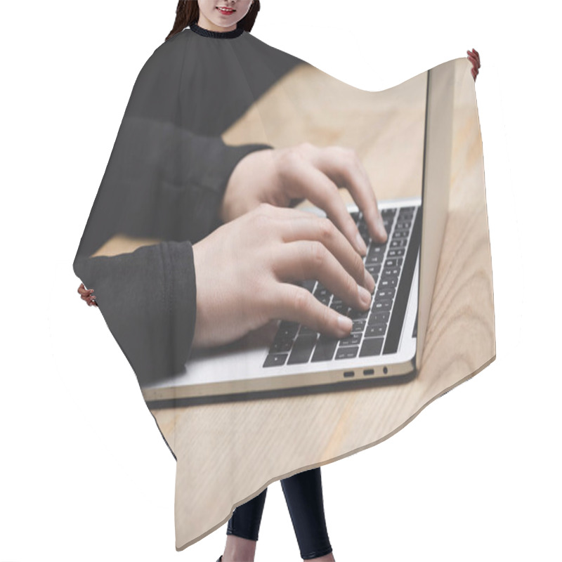 Personality  Cropped View Of Hacker Using Laptop And Sitting At Table  Hair Cutting Cape