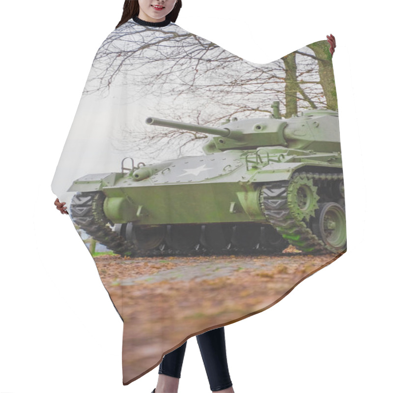 Personality  A Green Military Tank Displayed Outdoors In A Public Space, Surrounded By Autumn Colors And Set Against A Natural Park Background, Emphasizing Military History And Iconic Vehicle Designs. Hair Cutting Cape