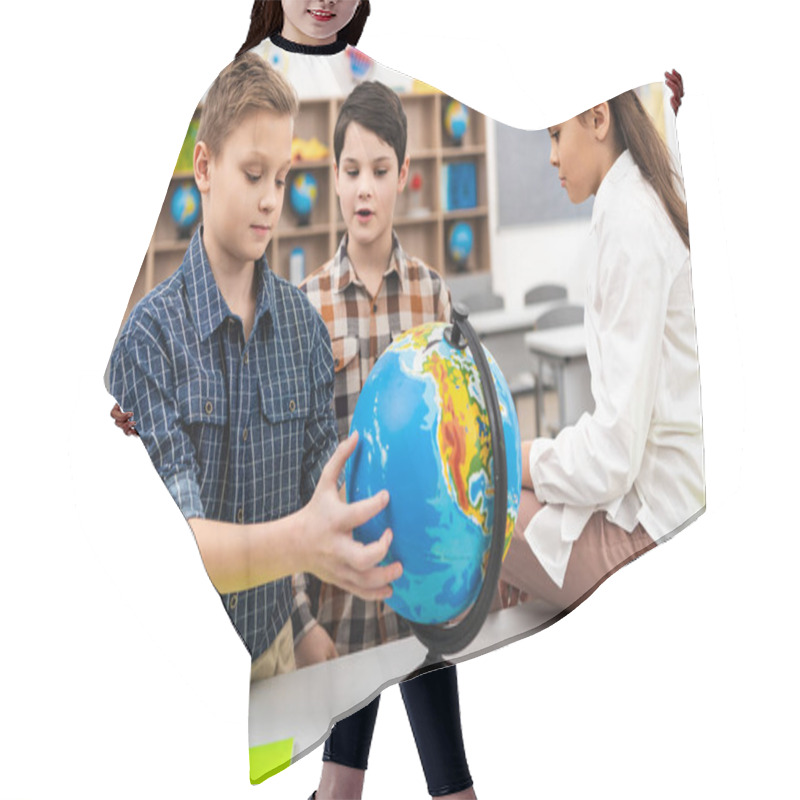 Personality  Three Cheerful Pupils Playing With Globe In Classroom During Geography Lesson Hair Cutting Cape