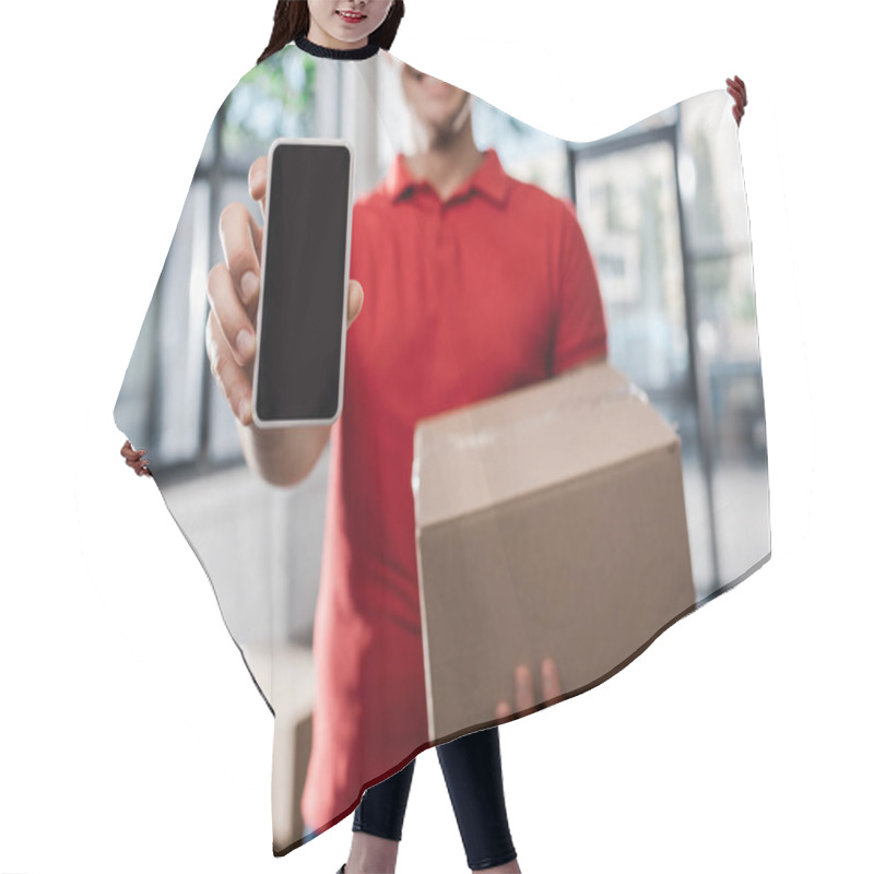 Personality  Cropped View Of Smiling Delivery Man Holding Smartphone With Blank Screen And Carton Box  Hair Cutting Cape