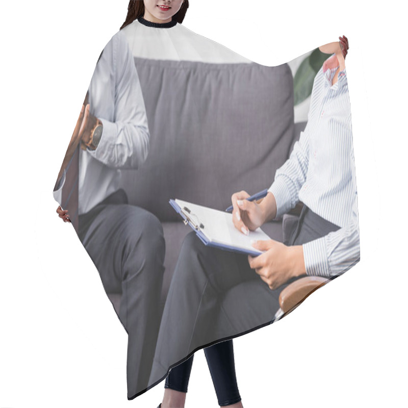 Personality  Cropped View Of African American Patient Gesturing While Speaking To Psychologist Holding Clipboard And Pen Hair Cutting Cape