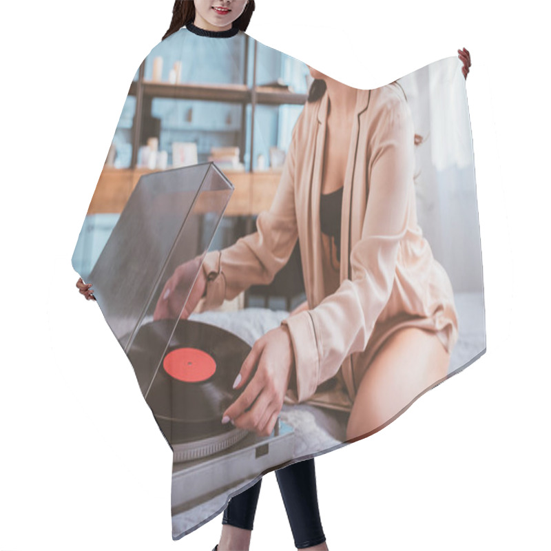 Personality  Cropped Shot Of Young Woman Turning On Vinyl Audio Player While Sitting On Bed At Home Hair Cutting Cape