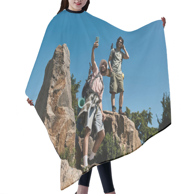 Personality  Two Young Gay Men Hike And Take A Selfie On A Rocky Mountaintop During A Summer Day. Hair Cutting Cape