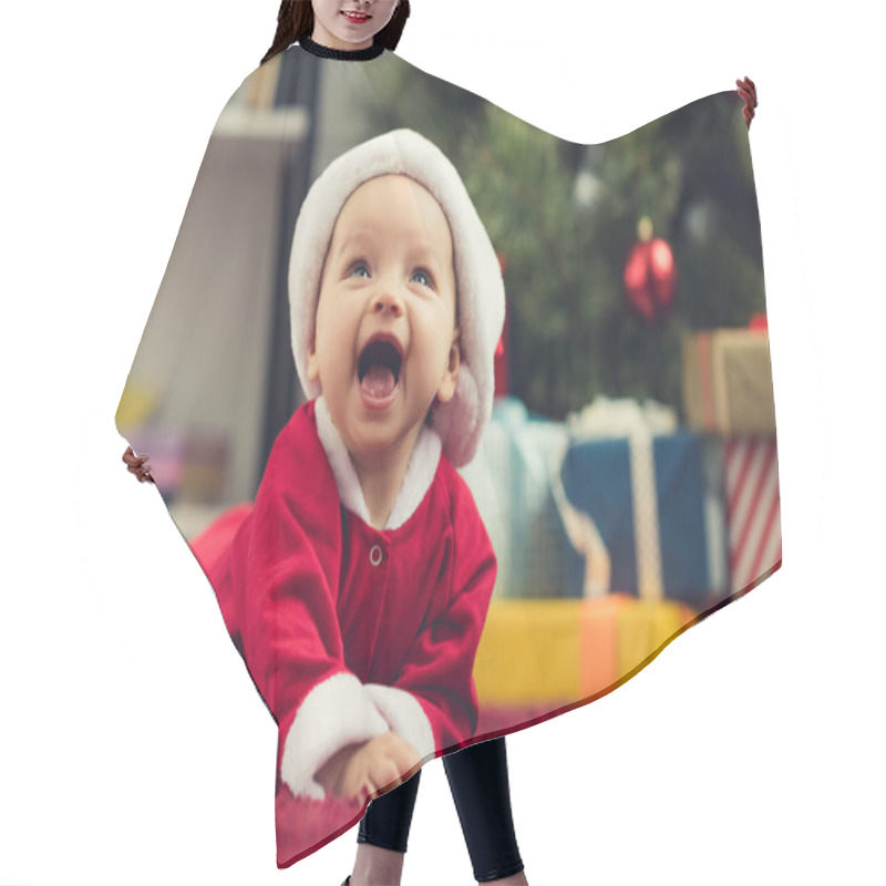 Personality  Close-up Portrait Of Laughing Little Baby In Santa Suit Lying On Red Carpet In Front Of Christmas Tree And Gifts Hair Cutting Cape