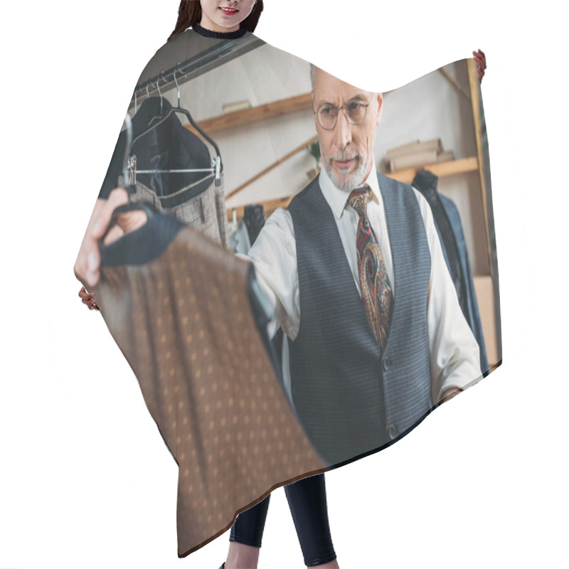 Personality  Handsome Mature Tailor Examining Clothes At Sewing Workshop Hair Cutting Cape