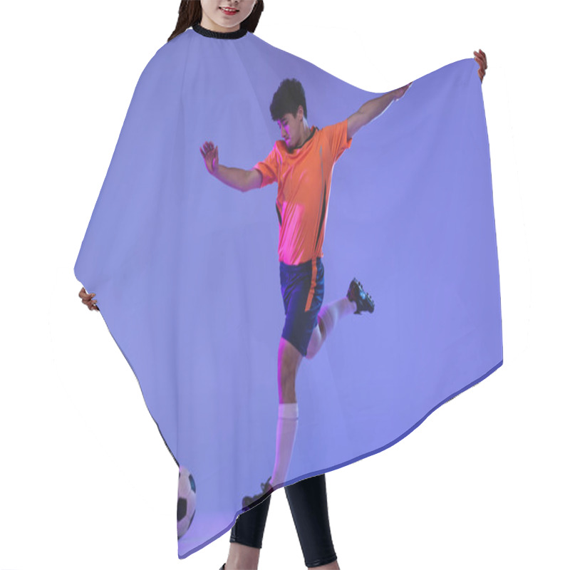 Personality  Studio Shot Of Male Professional Football, Soccer Player Practicing With Ball Isolated On Purple Background. Concept Of Sport, Match, Active Lifestyle, Goal And Hobby Hair Cutting Cape