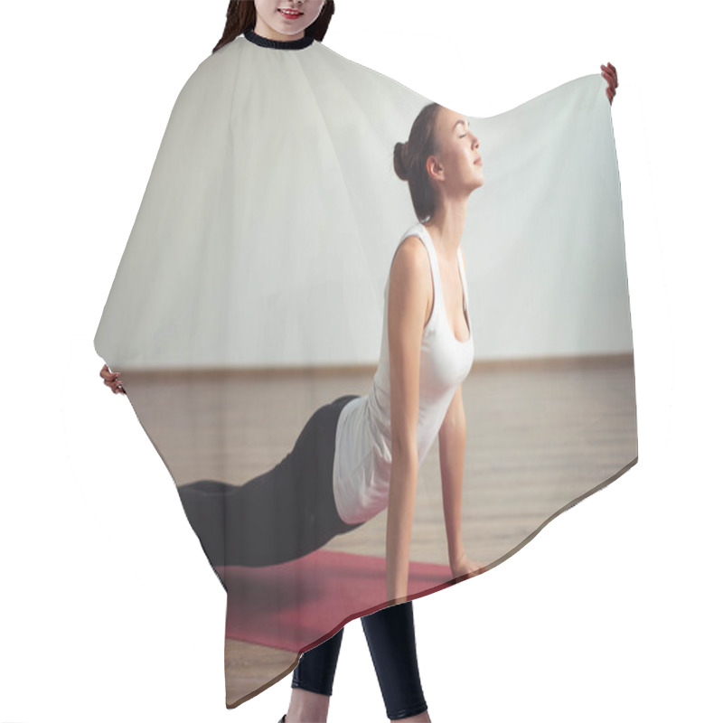 Personality  Woman Practicing Yoga Indoor. Beautiful Girl Practice Cobra Asana In Class Hair Cutting Cape