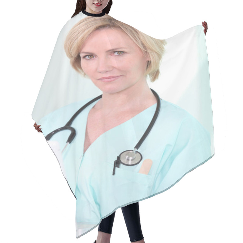 Personality  A Medical Professional Looking At Her Laptop Hair Cutting Cape