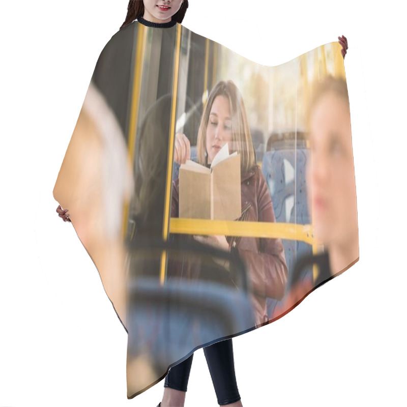 Personality  Girl Reading Book In Bus  Hair Cutting Cape