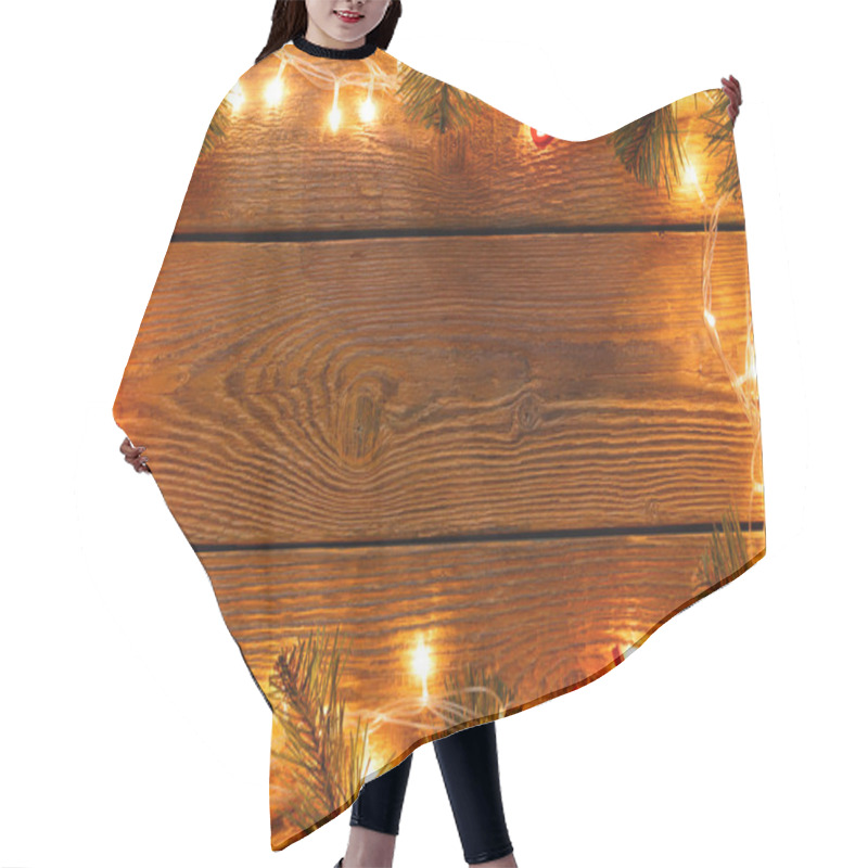 Personality  Image Of Wooden Surface With Burning Garland Around Perimeter, Branches Of Spruce, Felt Toys. Hair Cutting Cape