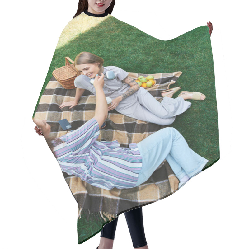 Personality  Two Friends Share Laughter And Snacks While Lounging On A Blanket Outdoors. Hair Cutting Cape