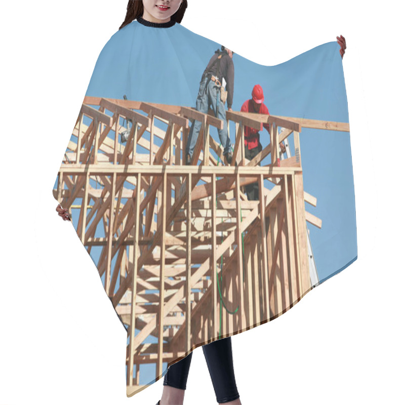 Personality  Building Site. New Houses Under Construction. Construction Site. New Residential Construction Of Wooden Frame House. Roofing Construction. Wooden Construction. Construction Site.  Hair Cutting Cape