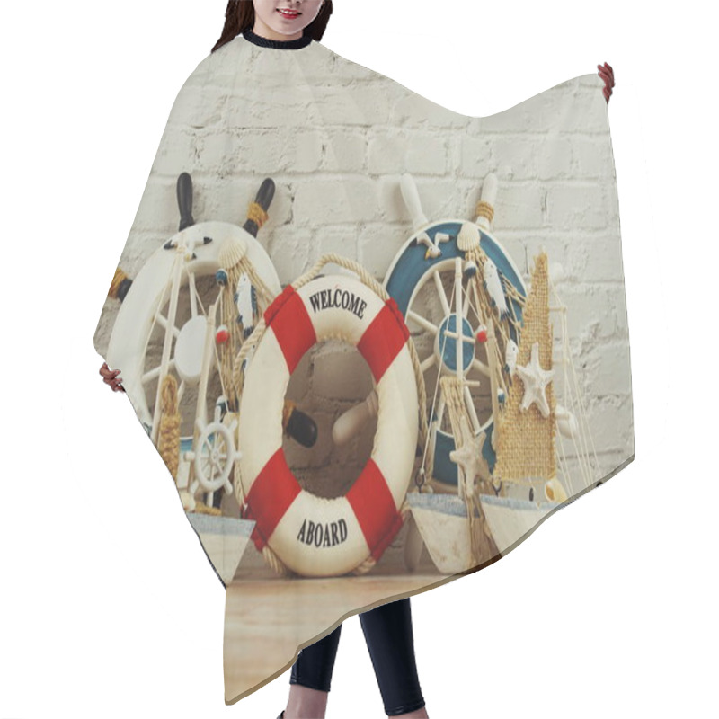 Personality  Lifebuoy Summer  Interior Decoration With Space Copy On Wooden Background Hair Cutting Cape