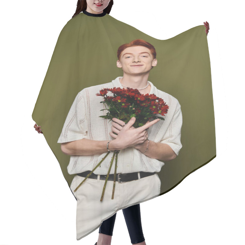 Personality  Young Man With Striking Red Hair Holds A Bouquet Of Red Flowers, Showcasing Joy And Emotion. Hair Cutting Cape