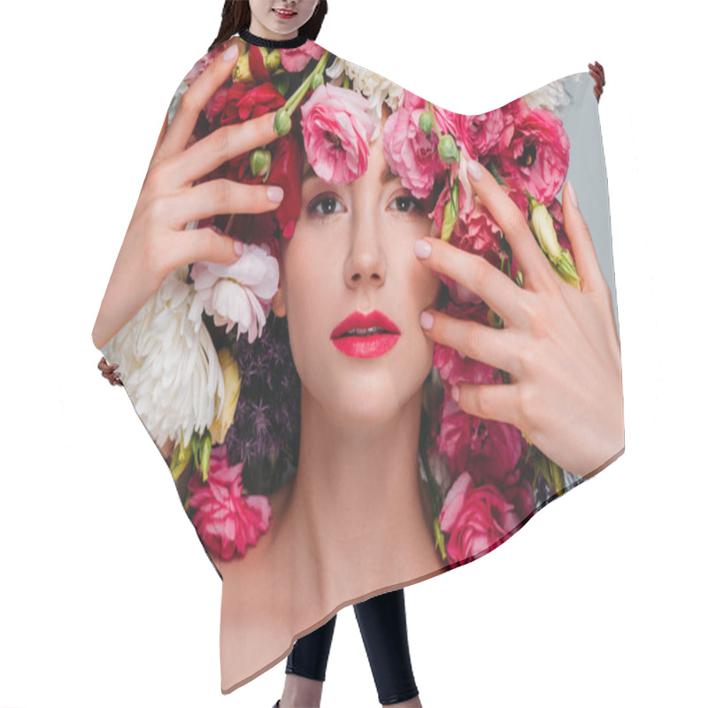 Personality  Portrait Of Gorgeous Young Woman With Flowers On Head Looking At Camera Isolated On Grey Hair Cutting Cape