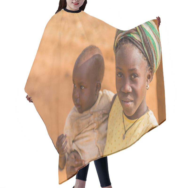 Personality  Bissau, Republic Of Guinea-Bissau: Portrait Of A Young Mother And Her Son, Outside The City Of Bissau, Guinea Bissau. Hair Cutting Cape