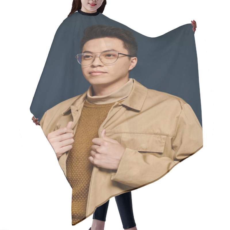 Personality  A Fashionable Young Man In A Trench Coat Strikes A Confident Pose, Exuding An Air Of Mystery And Sophistication. Hair Cutting Cape