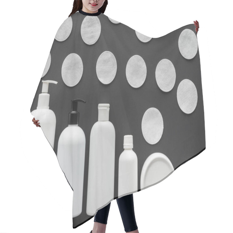 Personality  Top View Of Bottles Of Cream And Cosmetic Cotton Pads Isolated On Black, Beauty Concept  Hair Cutting Cape