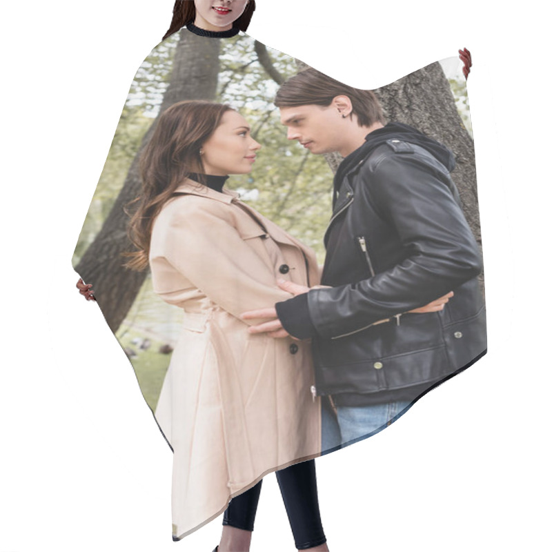 Personality  Side View Of Stylish Man And Pretty Woman In Trench Coat Hugging Near Tree In Park Hair Cutting Cape