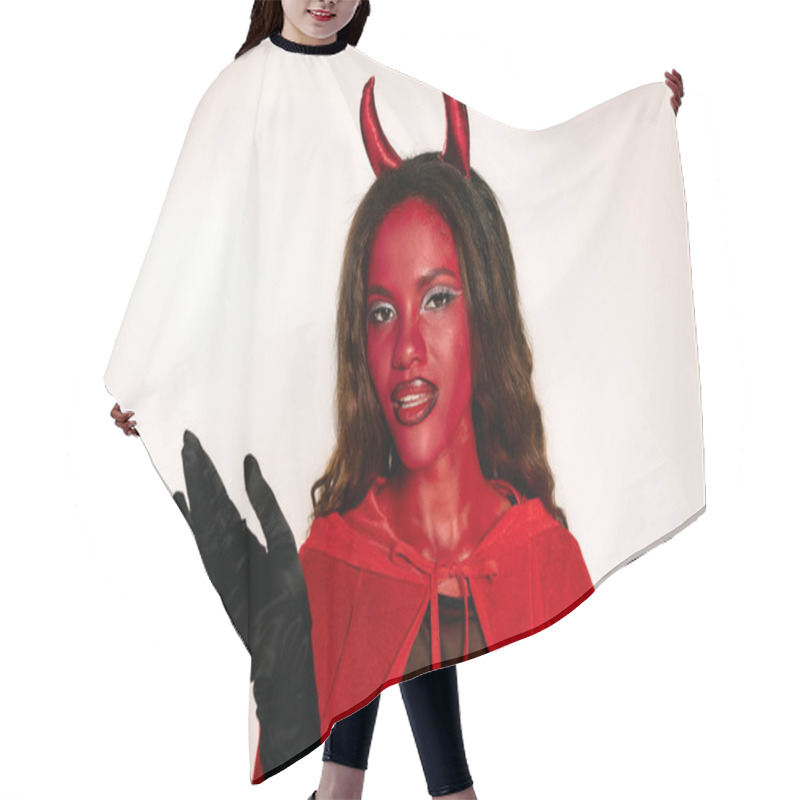 Personality  A Striking Woman In A Devil Costume Embraces The Halloween Spirit At A Lively Gathering. Hair Cutting Cape