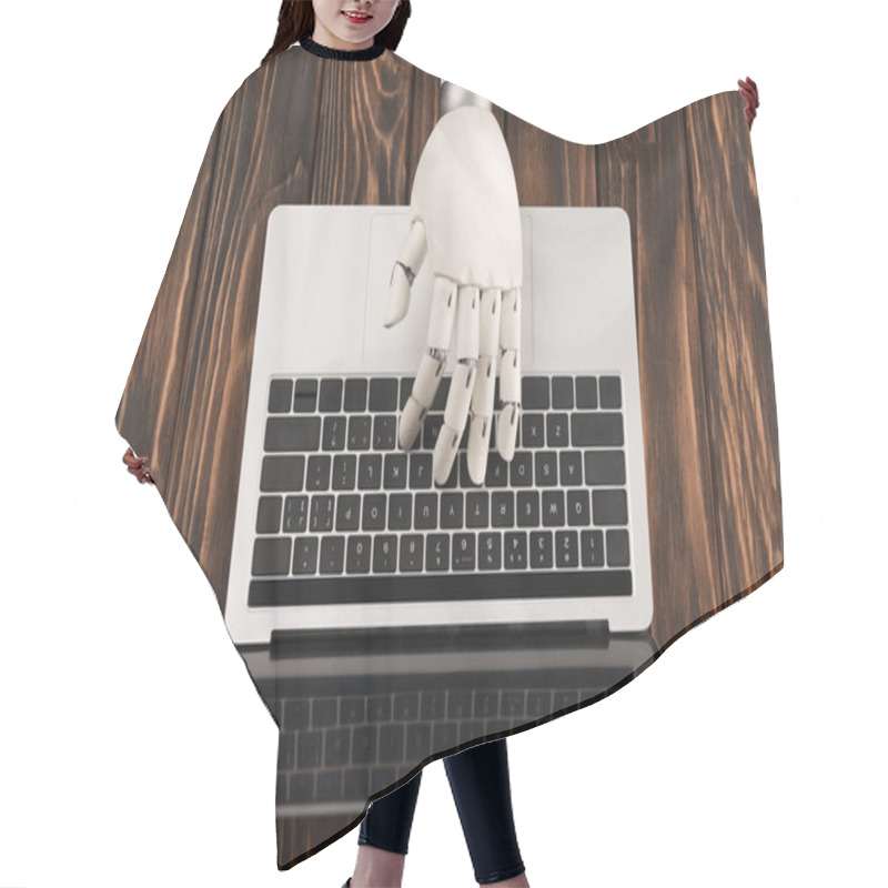 Personality  Cropped Shot Of Robot Working With Laptop On Wooden Surface Hair Cutting Cape