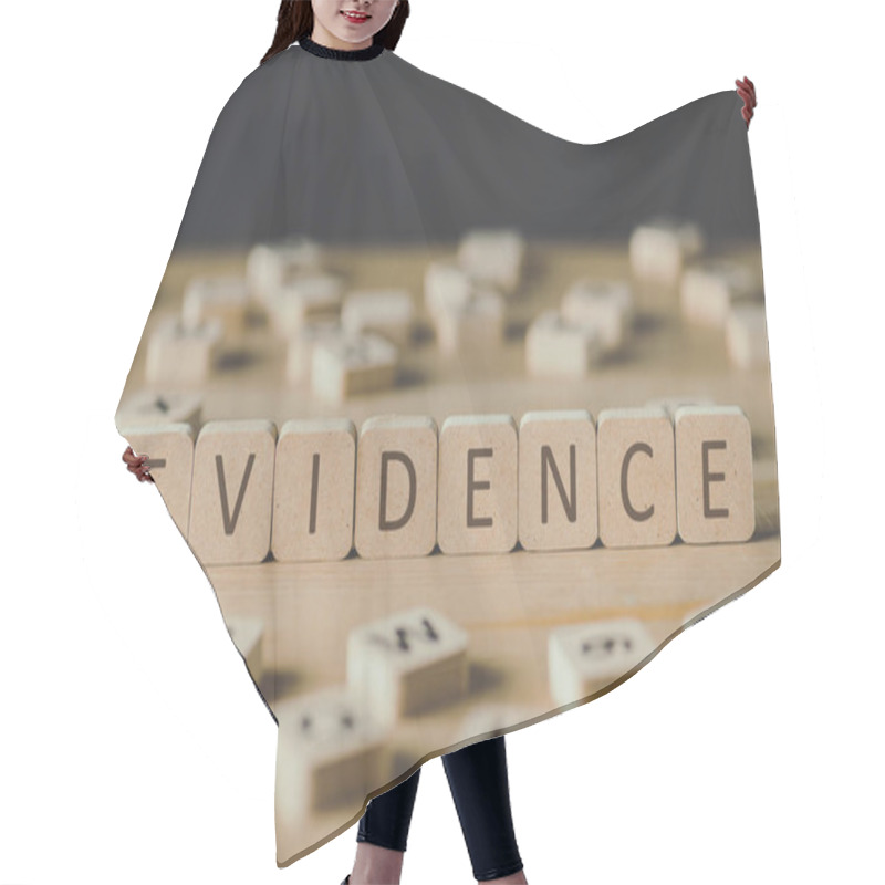 Personality  Selective Focus Of Word Evidence Made Of Cubes Surrounded By Blocks With Letters On Wooden Surface Isolated On Black Hair Cutting Cape