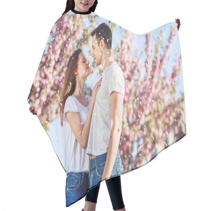 Personality  Couple Hugs Near Sakura Trees In Blooming Garden. Couple In Love Spend Time In Spring Garden, Flowers On Background, Close Up. Passion And Love Concept. Hair Cutting Cape