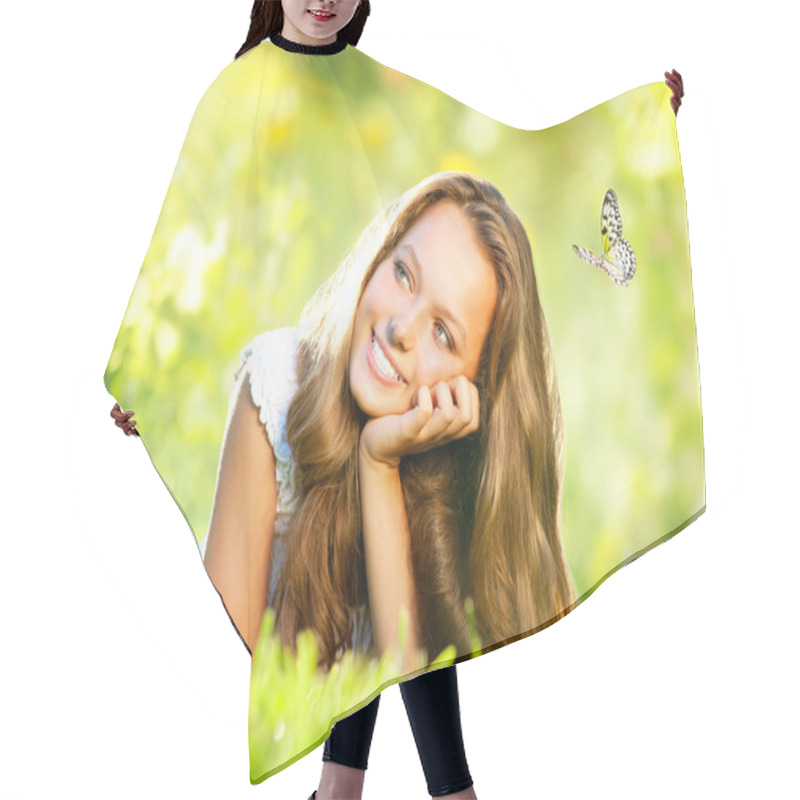 Personality  Spring Beauty. Beautiful Girl Lying On Green Grass Outdoor Hair Cutting Cape