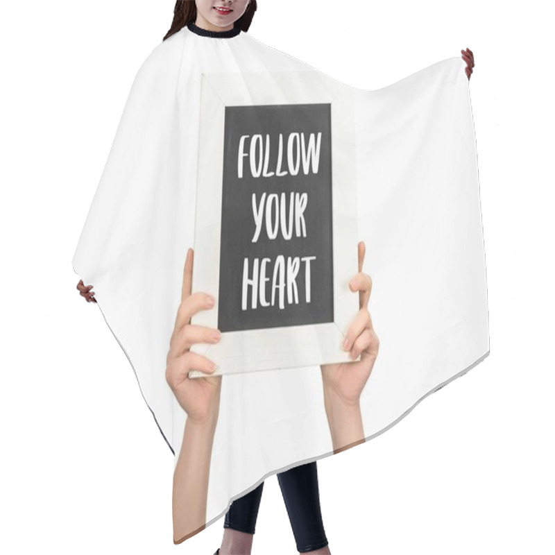 Personality  Cropped View Of Woman Holding Chalkboard With Inscription Follow Your Heart Isolated On White Hair Cutting Cape