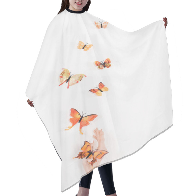 Personality  Cropped View Of Hand Near Orange Butterflies Flying On White Background, Environmental Saving Concept  Hair Cutting Cape