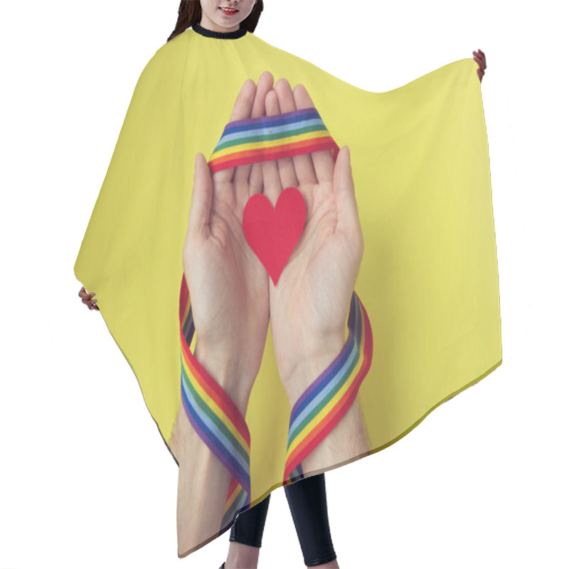 Personality  Male Hands With Rainbow Gay Pride LGBT Ribbon Wristband Holding Paper Red Heart On Yellow Background Hair Cutting Cape