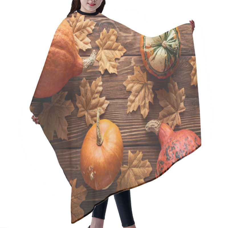 Personality  Top View Of Ripe Pumpkins On Brown Wooden Surface With Dry Autumn Leaves Hair Cutting Cape