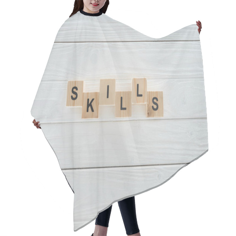 Personality  Top View Of Skills Inscription Made Of Blocks On White Wooden Surface Hair Cutting Cape