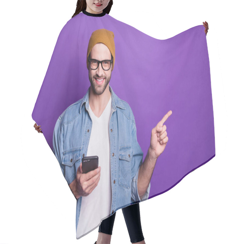 Personality  Photo Of Cool Guy Holding Telephone Indicating Finger Empty Space Wear Jeans Outfit Isolated Violet Background Hair Cutting Cape