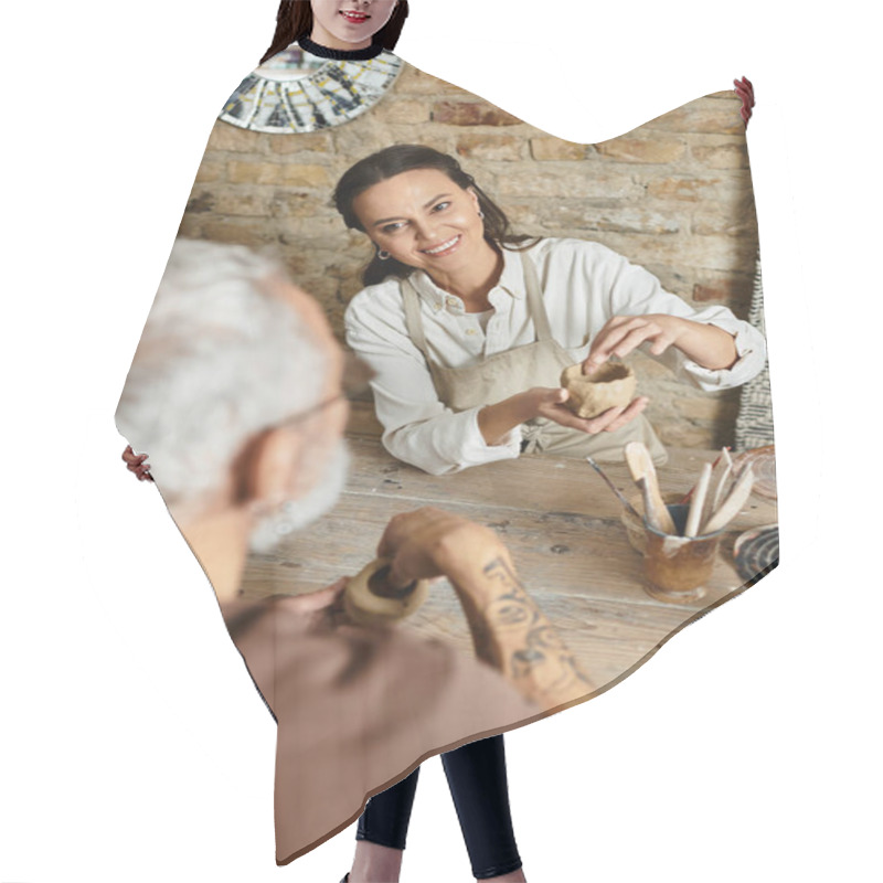 Personality  Mature Couple Enjoys Quality Time Shaping Clay In A Rustic Pottery Studio Filled With Creativity. Hair Cutting Cape