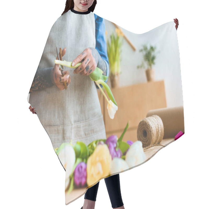 Personality  Cropped Shot Of Florist In Apron Cutting Tulip Flower Hair Cutting Cape