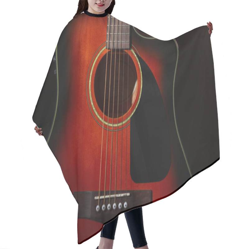 Personality  Acoustic Guitar. Part Of The Case And Strings On A Black Background. Hair Cutting Cape