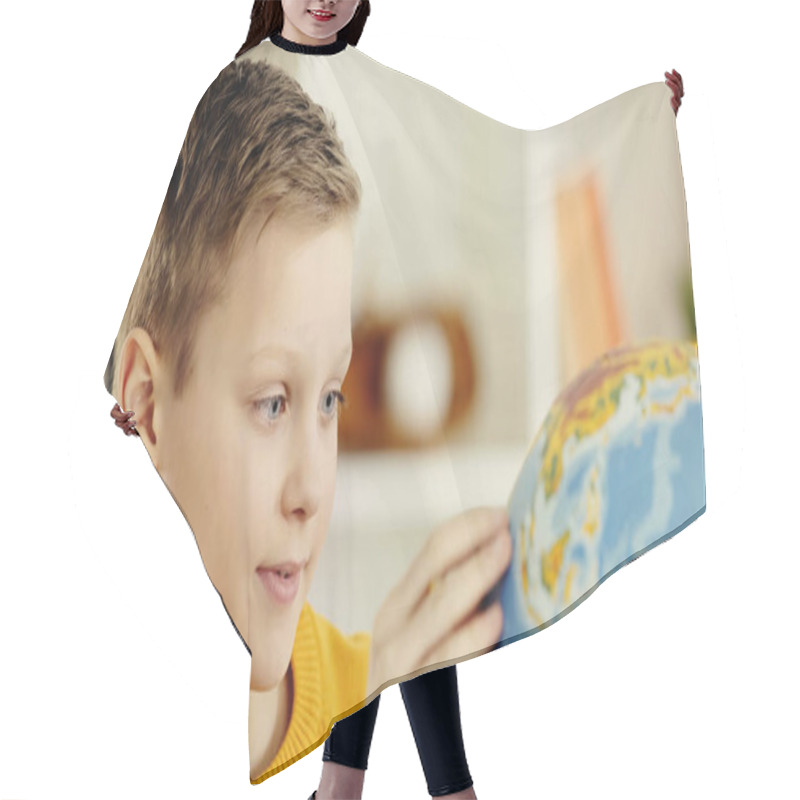 Personality  Preteen Boy With Blue Eyes Looking At Globe While Exploring World At Home  Hair Cutting Cape