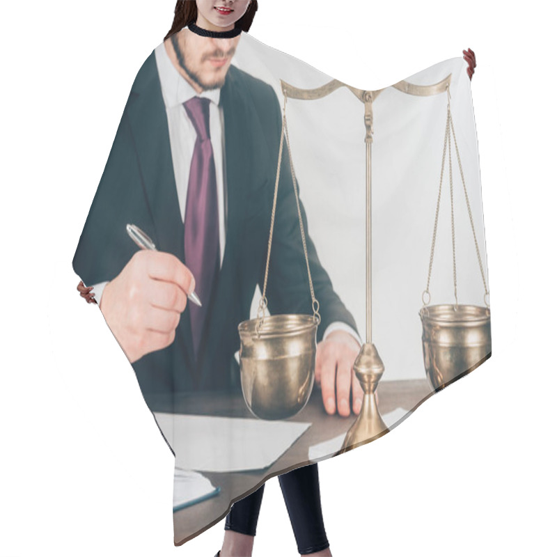 Personality  Cropped Shot Of Lawyer Doing Paperwork At Workplace With Scales Hair Cutting Cape