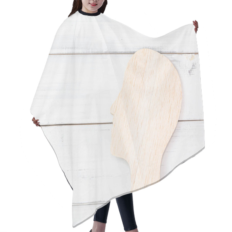 Personality  Wooden Profile Of A Human Head On White Rustic Wooden Background Hair Cutting Cape